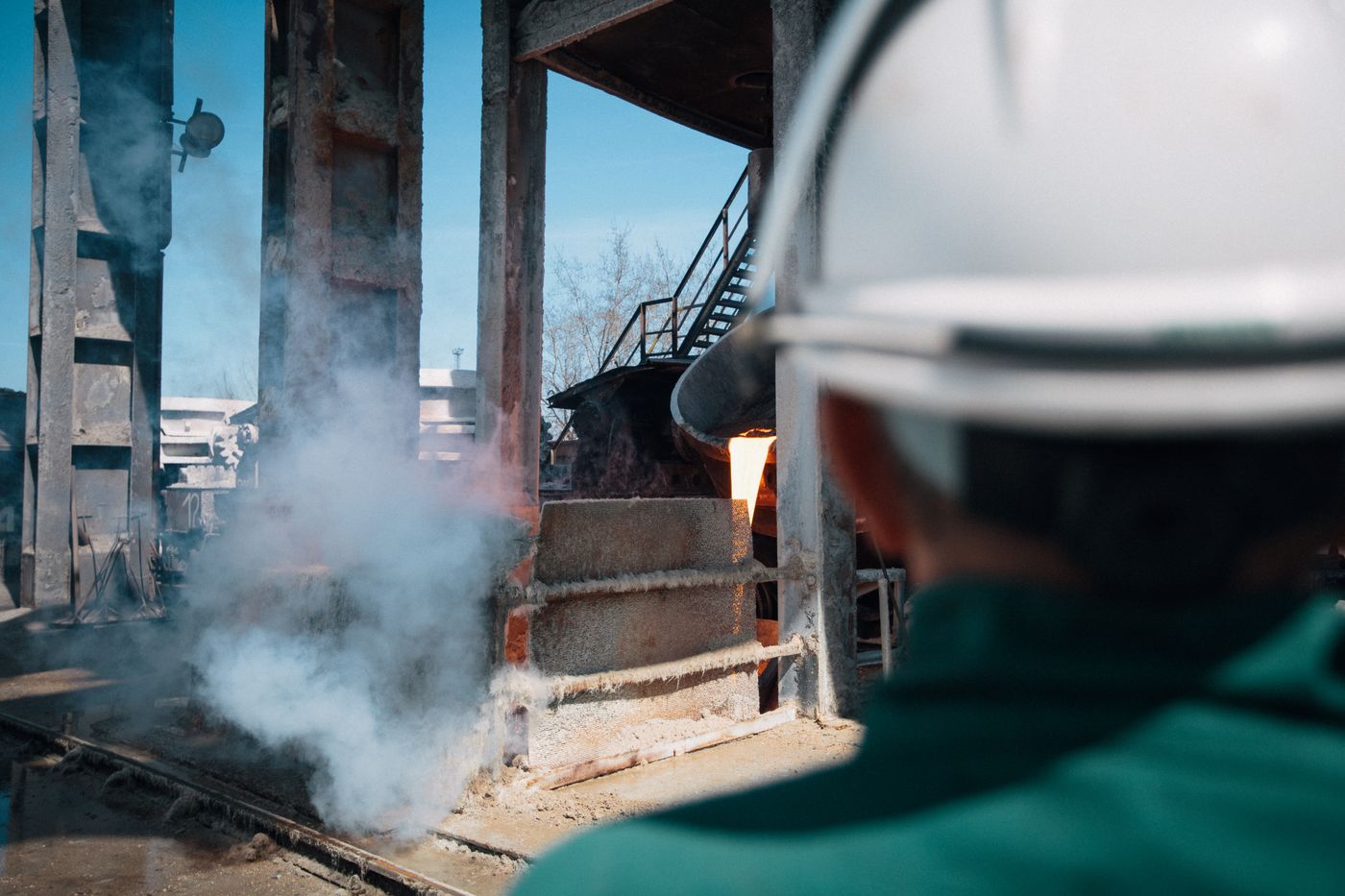 Industrial worker inspecting process conditions